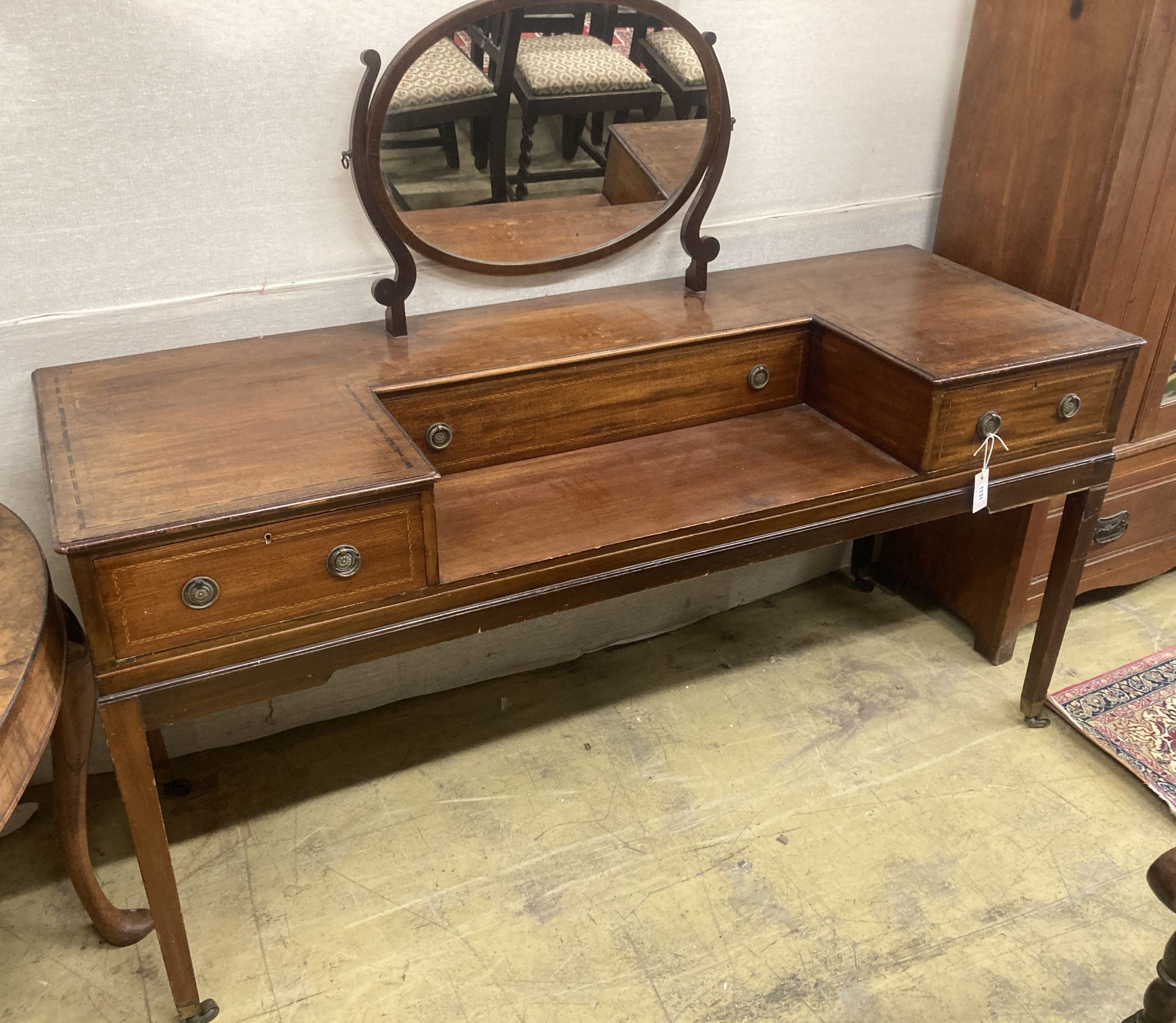 A mid 19th century mahogany dressing table,